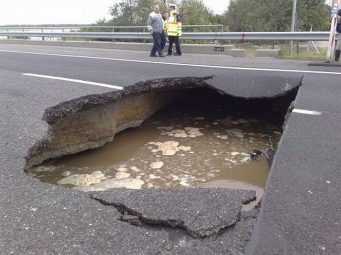 Rainwater sinkhole on highway, Hungary