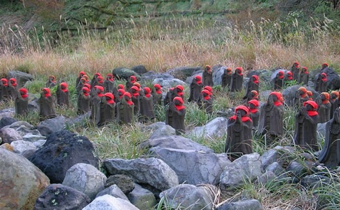 Jizo statues near volcano, Japan