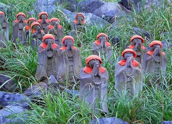 Jizo statues near volcano, Japan