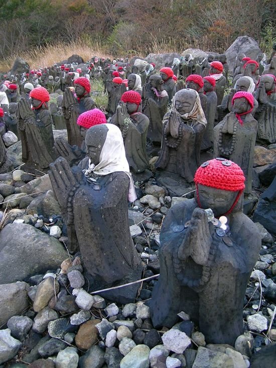 Jizo statues near volcano, Japan