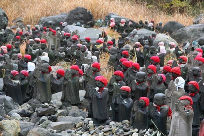 Jizo statues near volcano, Japan