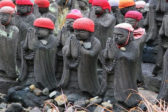 Jizo statues near volcano, Japan