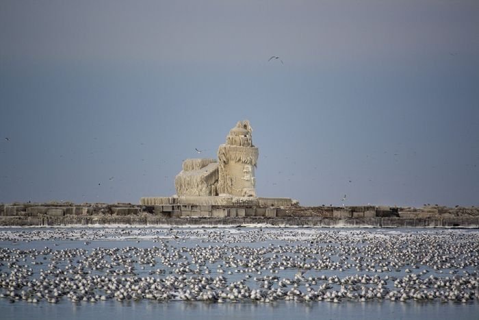 Frozen lighthouse, Lake Erie, North America