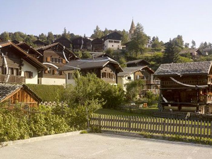 Illusion in small village, Alps