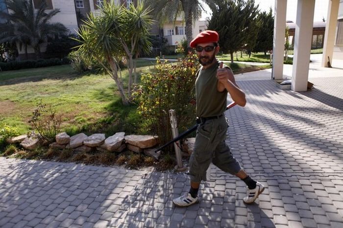 Rebels inside Muammar Muhammad al-Gaddafi villas, Libya