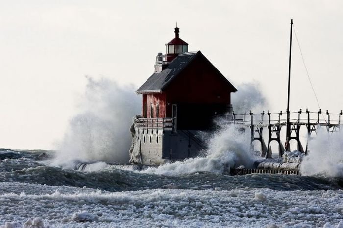 lighthouse in waves