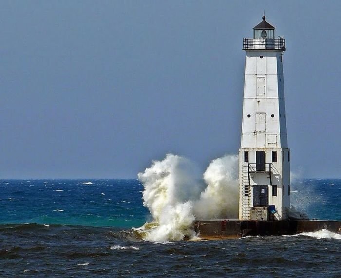 lighthouse in waves