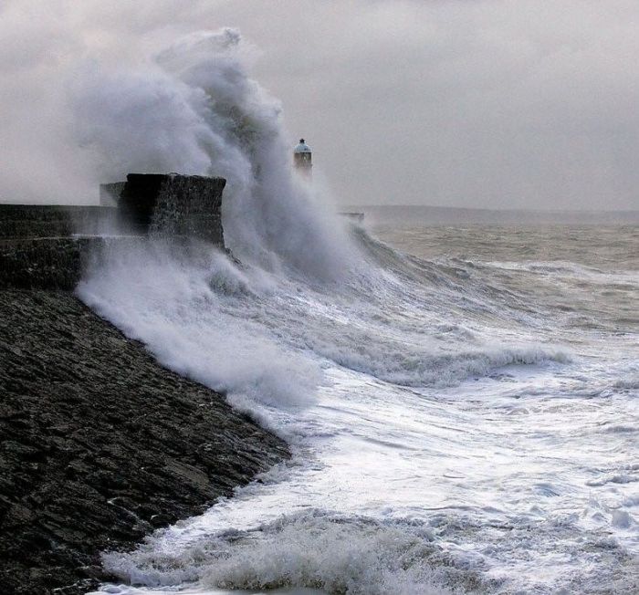 lighthouse in waves