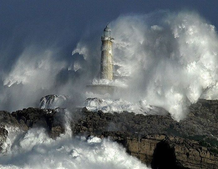 lighthouse in waves