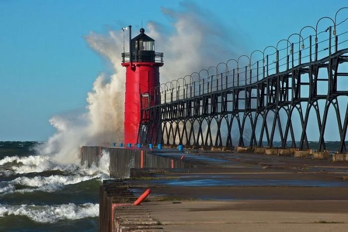 lighthouse in waves