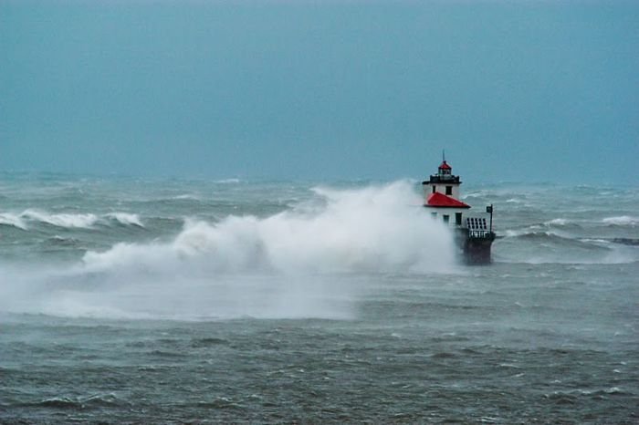 lighthouse in waves