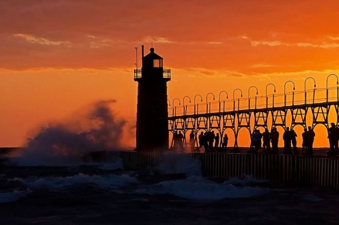 lighthouse in waves