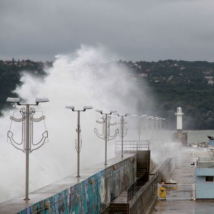 lighthouse in waves