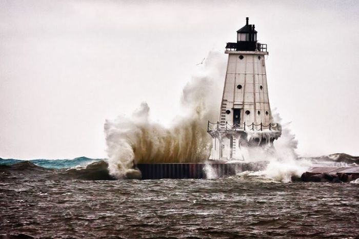 lighthouse in waves