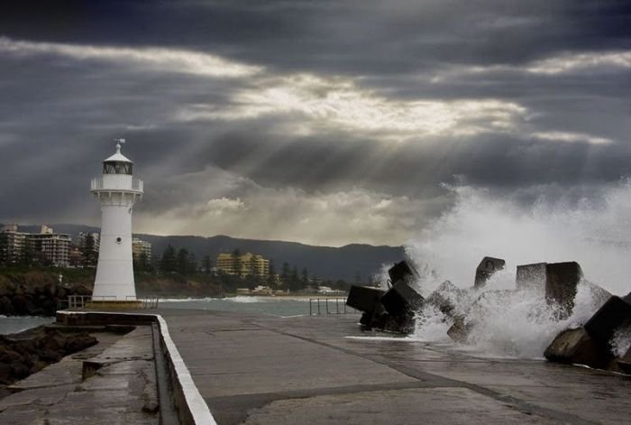 lighthouse in waves