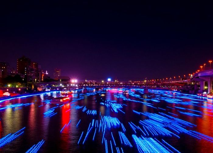 River of light with electronic LED fireflies, Sumida river, Tokyo