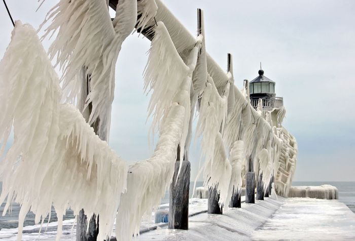 Frozen lighthouse, St. Joseph North Pier, Lake Michigan, North America