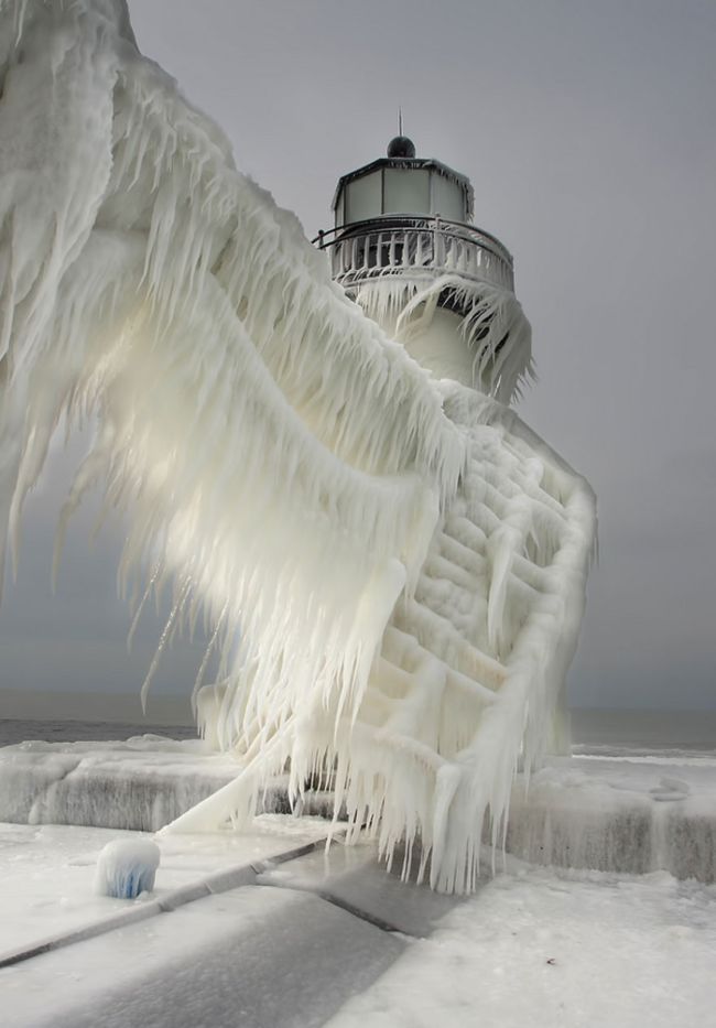 Frozen lighthouse, St. Joseph North Pier, Lake Michigan, North America