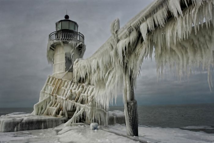 Frozen lighthouse, St. Joseph North Pier, Lake Michigan, North America