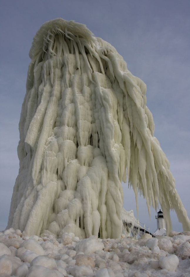 Frozen lighthouse, St. Joseph North Pier, Lake Michigan, North America