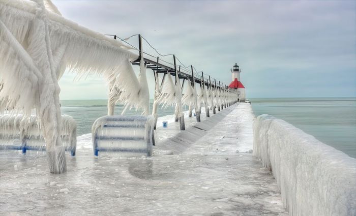 Frozen lighthouse, St. Joseph North Pier, Lake Michigan, North America