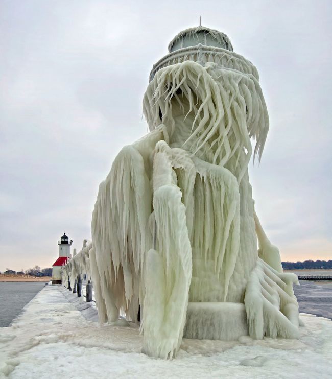 Frozen lighthouse, St. Joseph North Pier, Lake Michigan, North America