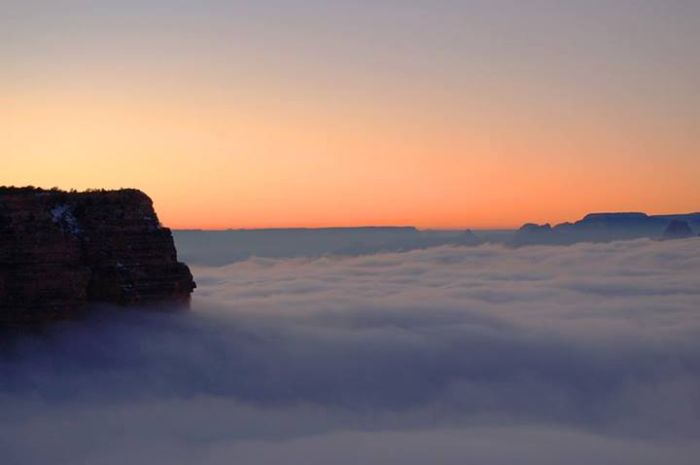 Grand Canyon covered in fog, Arizona, United States