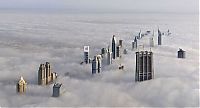 Trek.Today search results: bird's-eye view of buildings above the clouds