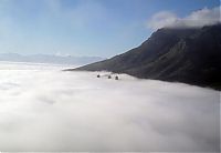 Trek.Today search results: bird's-eye view of buildings above the clouds