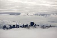 Trek.Today search results: bird's-eye view of buildings above the clouds