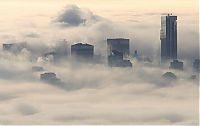 Trek.Today search results: bird's-eye view of buildings above the clouds