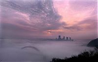 Trek.Today search results: bird's-eye view of buildings above the clouds