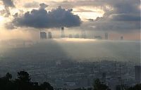 Trek.Today search results: bird's-eye view of buildings above the clouds