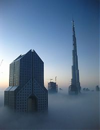 Trek.Today search results: bird's-eye view of buildings above the clouds