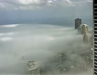 Trek.Today search results: bird's-eye view of buildings above the clouds