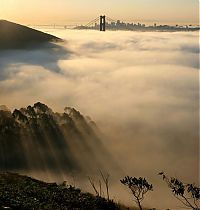 Trek.Today search results: bird's-eye view of buildings above the clouds