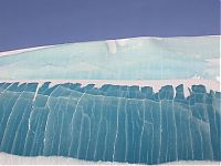 World & Travel: Blue ice from frozen waves, Antarctica