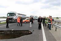 World & Travel: Rainwater sinkhole on highway, Hungary