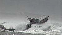 World & Travel: Coast Guard on the giant waves