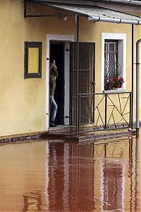 World & Travel: Red sludge alumina factory reservoir pollutes villages, Hungary