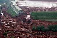 World & Travel: Red sludge alumina factory reservoir pollutes villages, Hungary