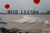 World & Travel: World's largest tidal bore, Qiantang River, China