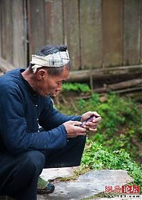 Trek.Today search results: Sickle haircut, Liang Qi, Dong village, China