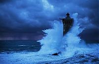 World & Travel: Lighthouse in the storm, France