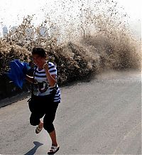 Trek.Today search results: World's larges tidal bore, 9 metres (30 ft) high, Qiantang River, China