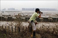 Trek.Today search results: World's larges tidal bore, 9 metres (30 ft) high, Qiantang River, China