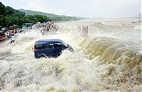 Trek.Today search results: World's larges tidal bore, 9 metres (30 ft) high, Qiantang River, China