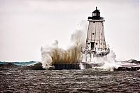World & Travel: lighthouse in waves