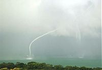 World & Travel: waterspout tornado