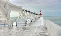 World & Travel: Frozen lighthouse, St. Joseph North Pier, Lake Michigan, North America